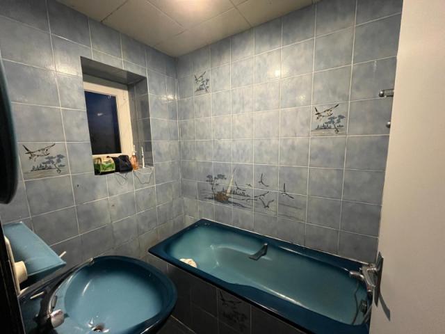 Transformation d'une salle de bain en salle d'eau PMR